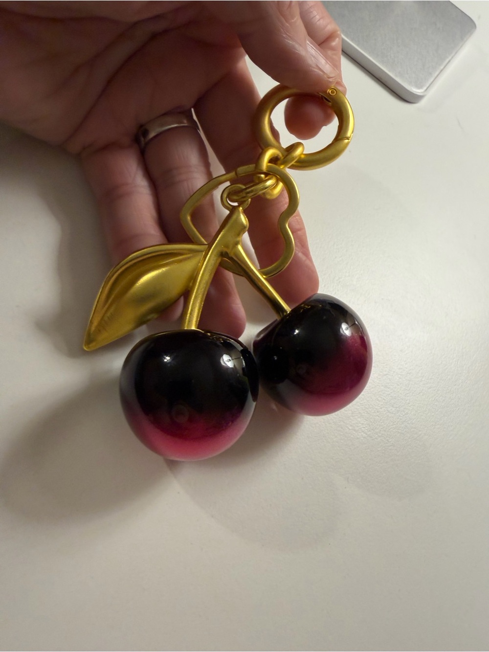 Source Unknown Gold Cherry Keychain with Black-to-Pink Cherries